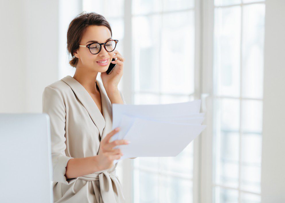 WOman calling roofing company in phoenix az