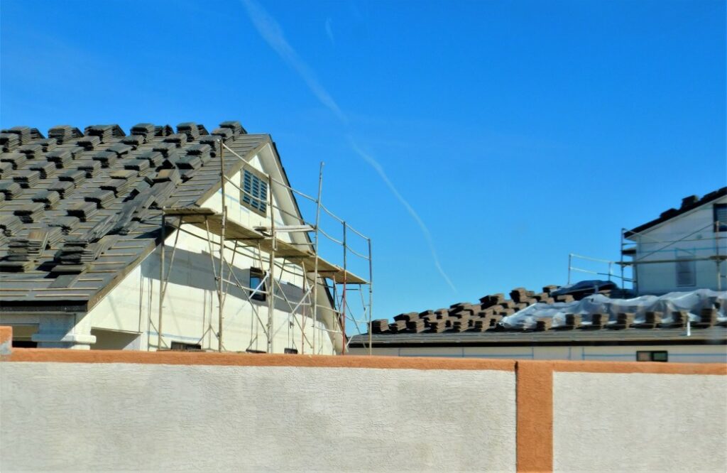A new shingle roof being laid